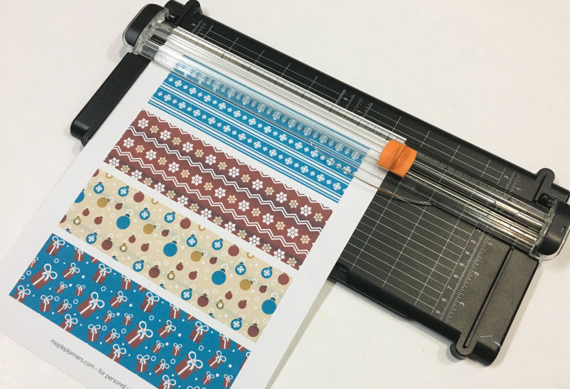 Cut out the printable bookmarks using a paper cutter